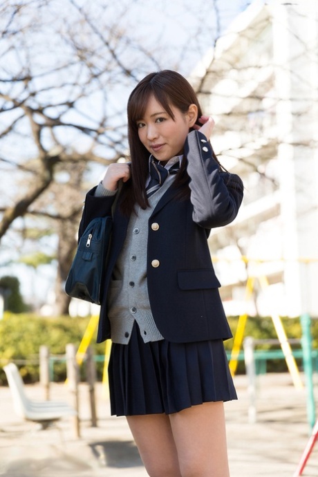 Japanese schoolgirl pulls down her cotton underwear during upskirt action 40973728