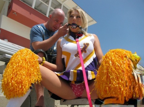 Ball gagged teen cheerleader Shawna Lenee gets used hard on a sex swing 25656591