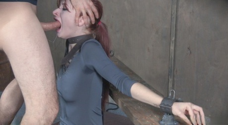 Redhead sex slave Violet Monroe is forced to deepthroat a cock 41013172