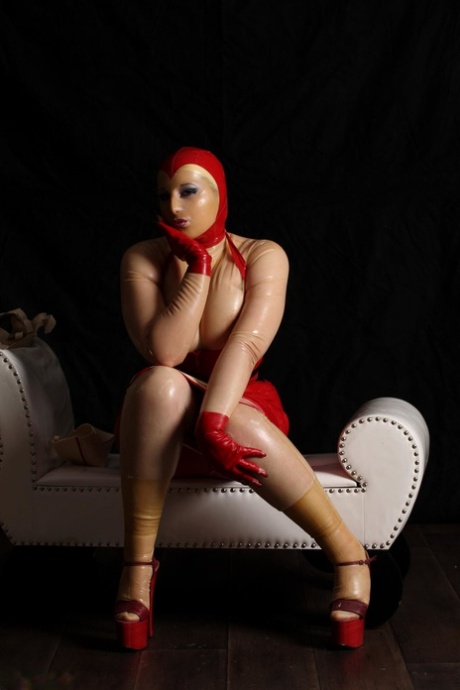 Blonde nurse Avengelique dons a gas mask while outfitted in a latex uniform 48236418